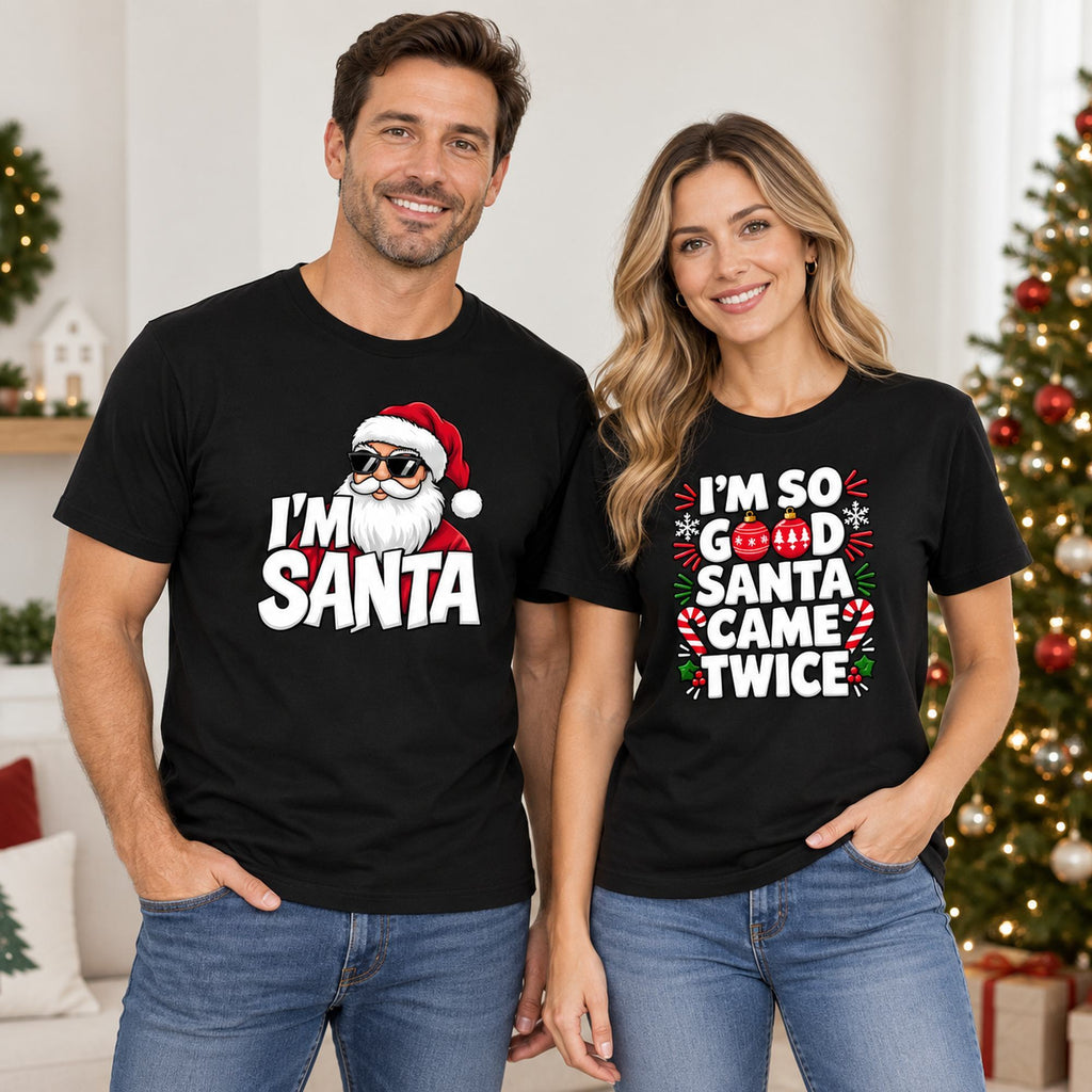 I'm Santa Christmas graphic tees in black, front view on a couple wearing the men's and women's designs
