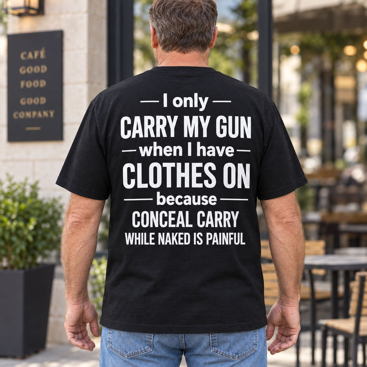 I Only Carry My Gun funny black T-shirt back print on male model