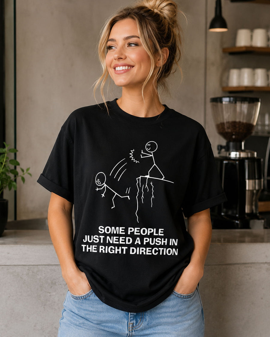 A playful direction-themed graphic tee with a bold stick-figure front print.