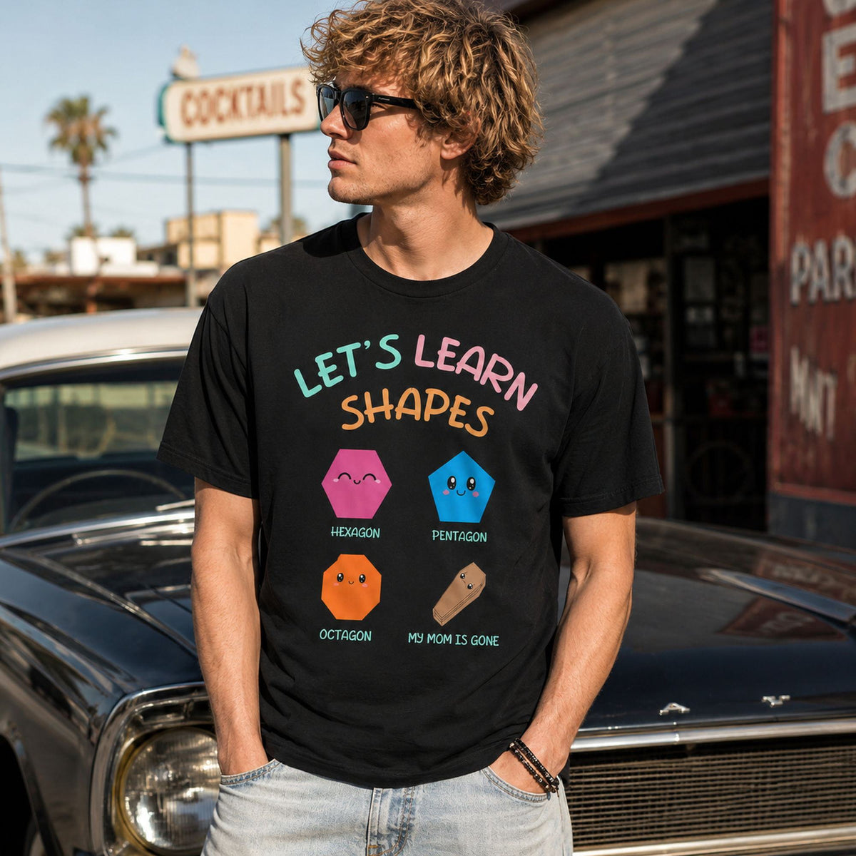 Let's Learn Shapes dark humor graphic tee black front street lifestyle male model