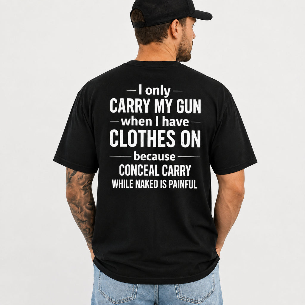 Male model wearing black I Only Carry My Gun concealed carry humor graphic tee, oversized back print