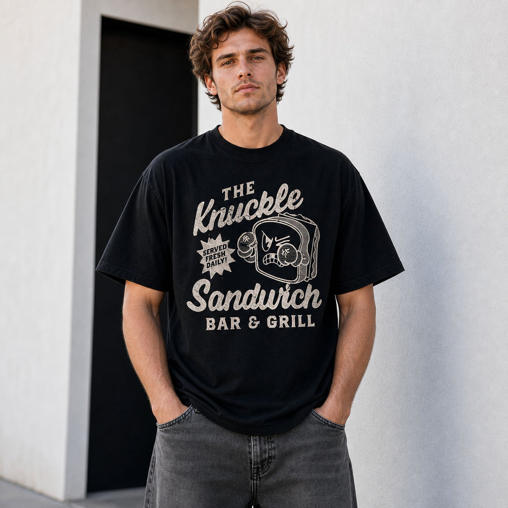 The Knuckle Sandwich Bar & Grill Funny Graphic Tee front print product photo 01 | Diya Glow