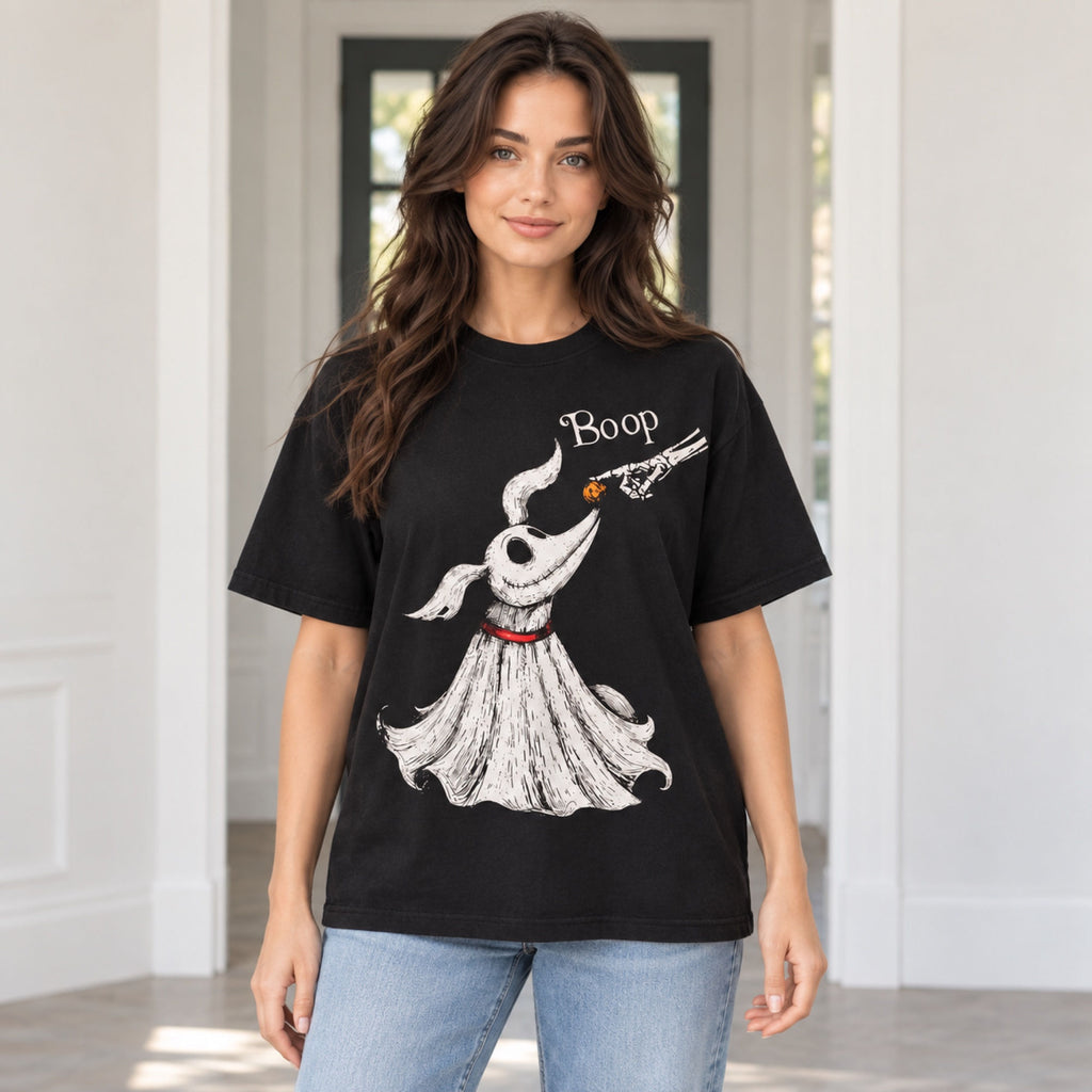 Boop ghost dog Halloween graphic tee in black, front print on a female model in a bright doorway