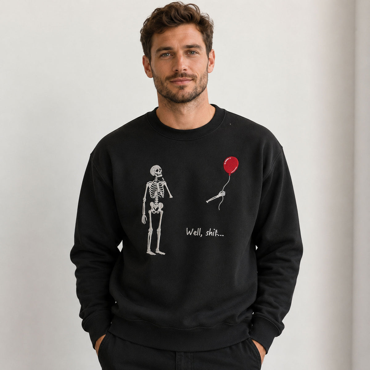 Well Shit skeleton balloon embroidered design black sweatshirt male model front view