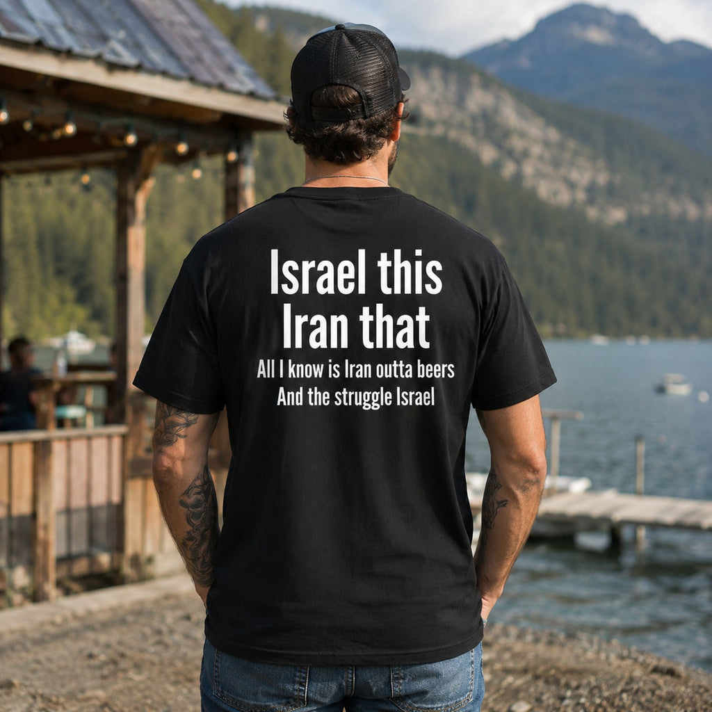 Israel This Iran That funny beer back-print black graphic tee on a male model beside a mountain lake