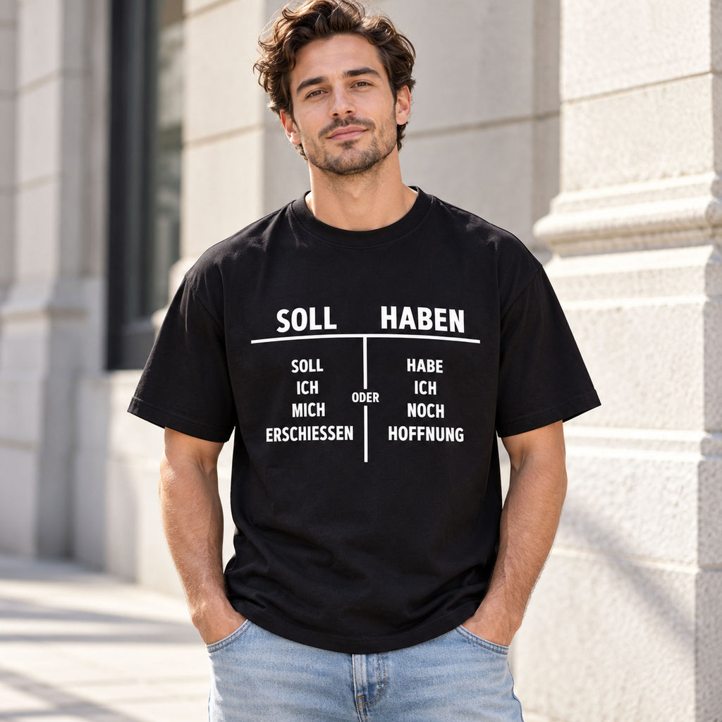 Soll Haben German accounting wordplay and original dark-humor table graphic on black T-shirt front, adult model photo