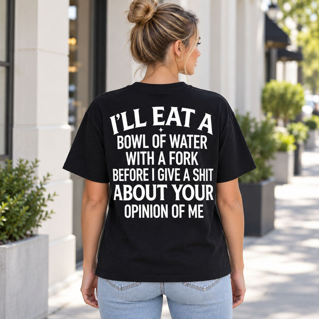 Bowl of Water With a Fork uncensored opinion-of-me slogan on black T-shirt back, adult model photo