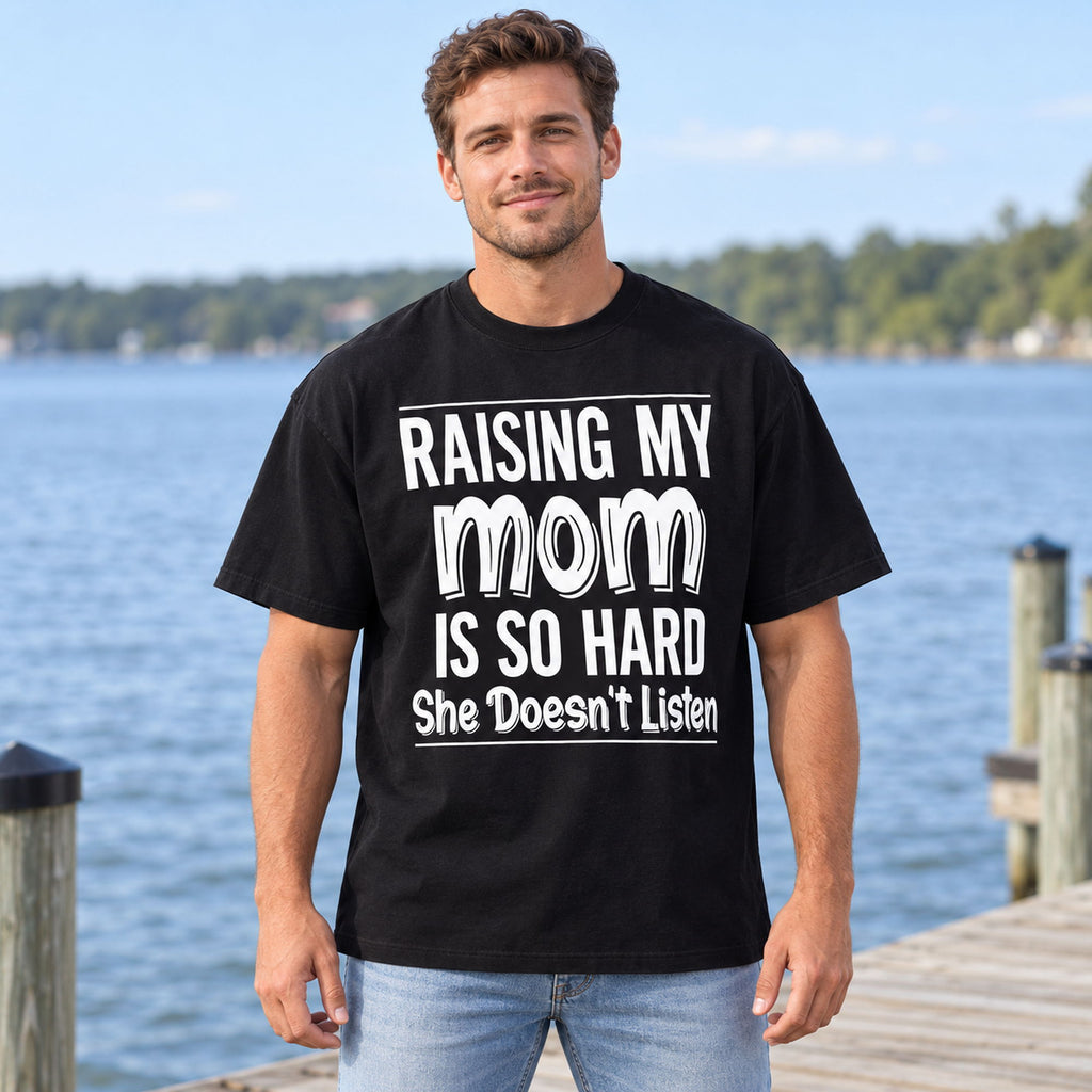 Raising My Mom She Doesnt Listen joke black front-print tee on outdoor model