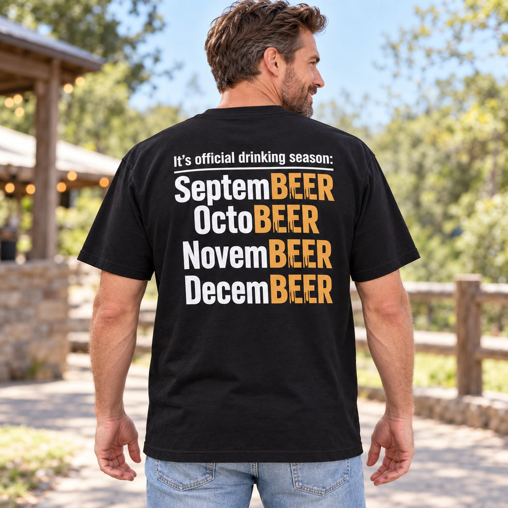 Official Drinking Season SeptemBEER month joke on black T-shirt back, adult male model outdoors