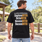 Official Drinking Season SeptemBEER month joke on black T-shirt back, adult male model outdoors