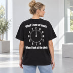 Black graphic tee back adult model with What I See At Work lettering design