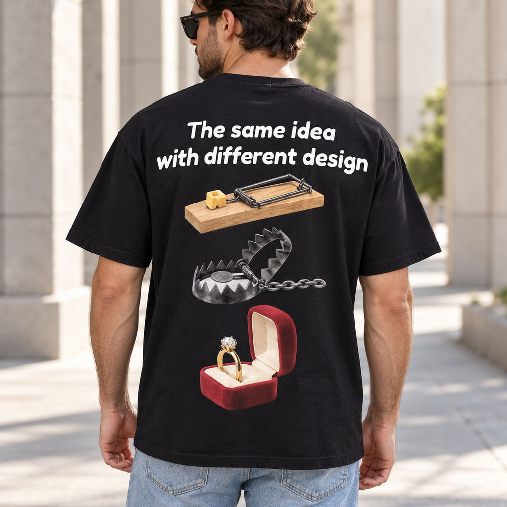 The same idea with different design mousetrap steel trap and ring box graphic on black T-shirt back, adult model photo