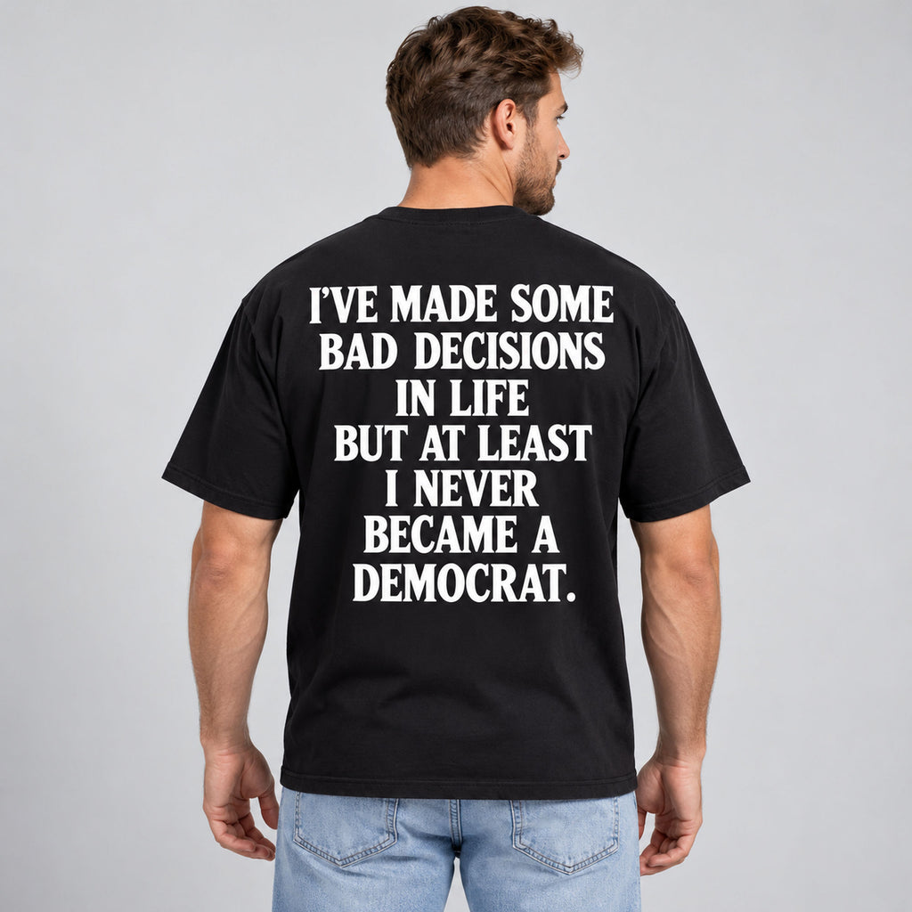 Never Became a Democrat statement black back-print tee on outdoor model