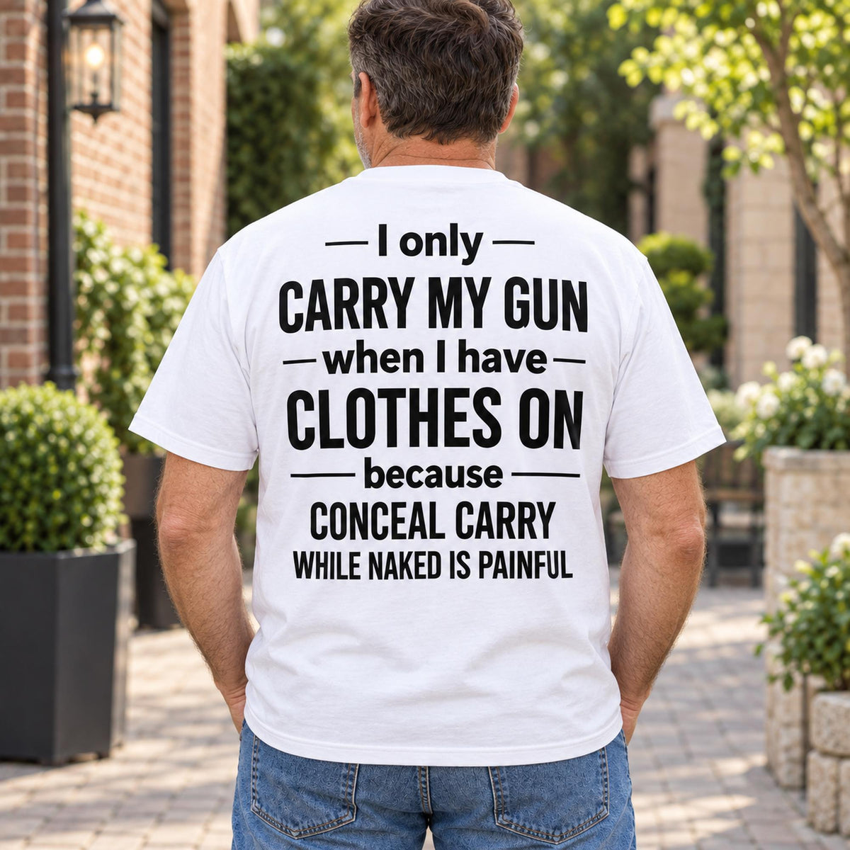 White I Only Carry My Gun slogan T-shirt rear view on male model