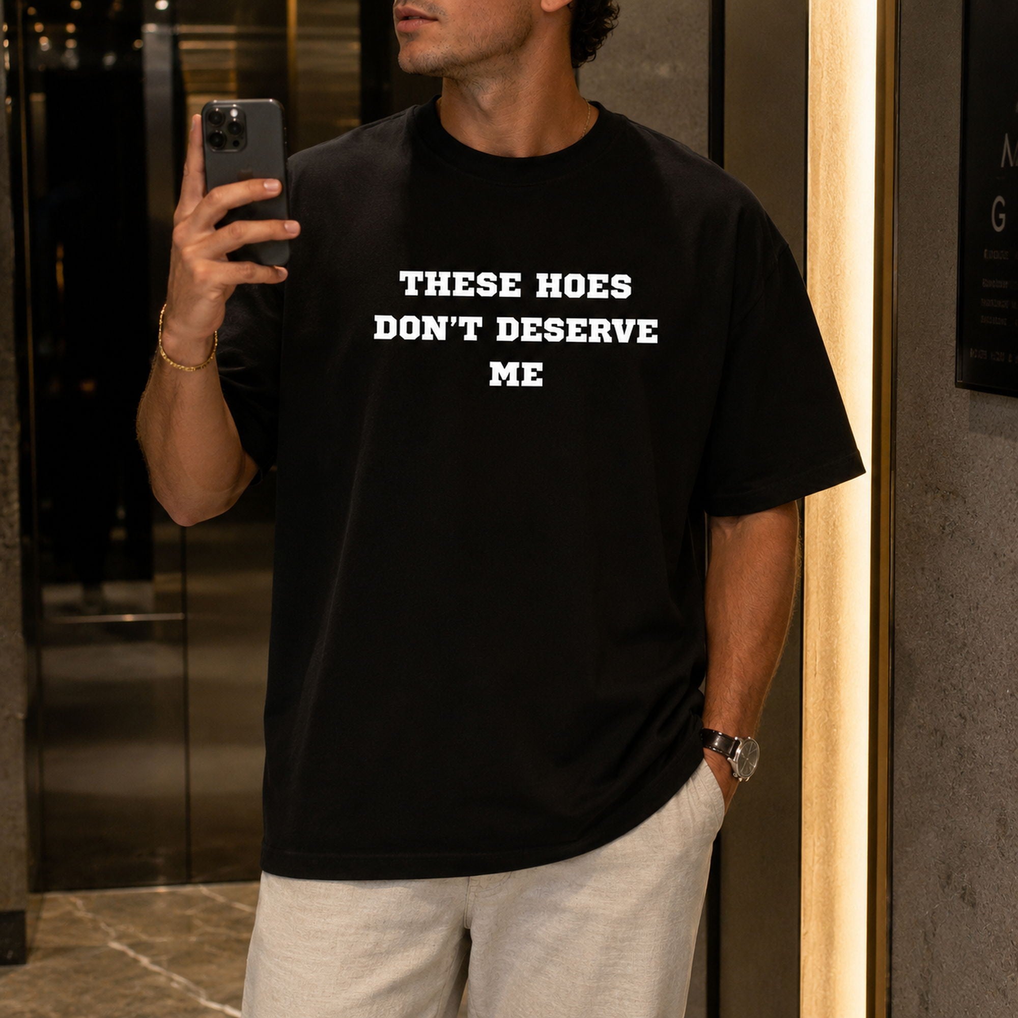 These Hoes Don't Deserve Me funny graphic tee black front mirror lifestyle model