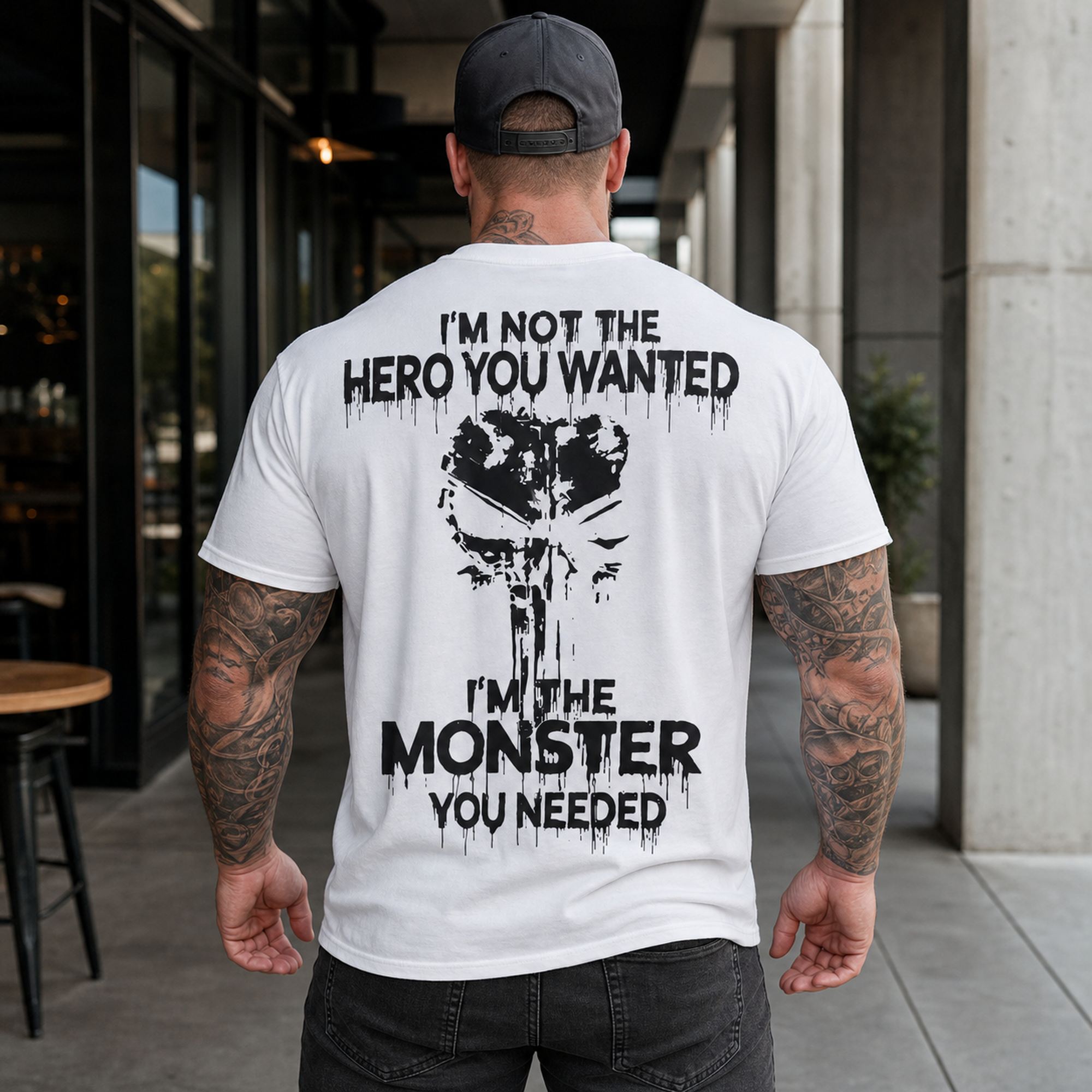 I'm Not the Hero You Wanted monster back print graphic tee white male model