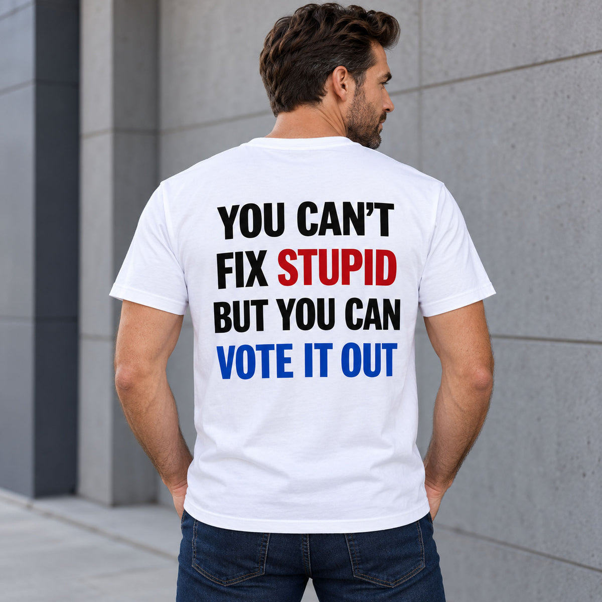 You Cant Fix Stupid But You Can Vote It Out red white blue slogan graphic on white T-shirt back, adult model photo