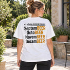 Official Drinking Season beer-month wordplay on white T-shirt back, adult female model outdoors
