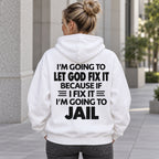 Let God Fix It because if I fix it I am going to jail slogan on white hoodie back, adult model photo