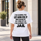 Let God Fix It funny jail punchline on white T-shirt back, adult female model outdoors