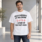 Hello Darkness My Old Friend white graphic tee, front model showing black lettering and a red heart in the heartbeat line