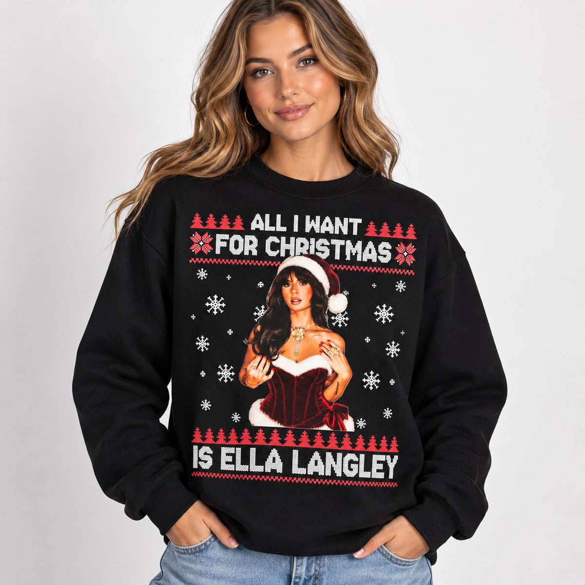 All I Want for Christmas Is Ella Langley black sweatshirt on a model, white lettering and red trees around the front portrait