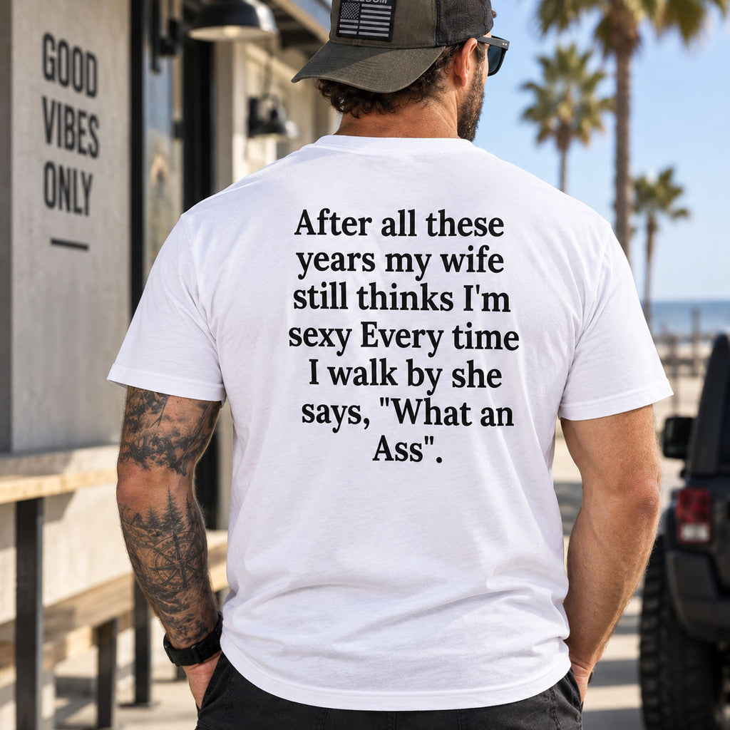 After All These Years My Wife funny white T-shirt, outdoor model displaying the marriage joke on the back