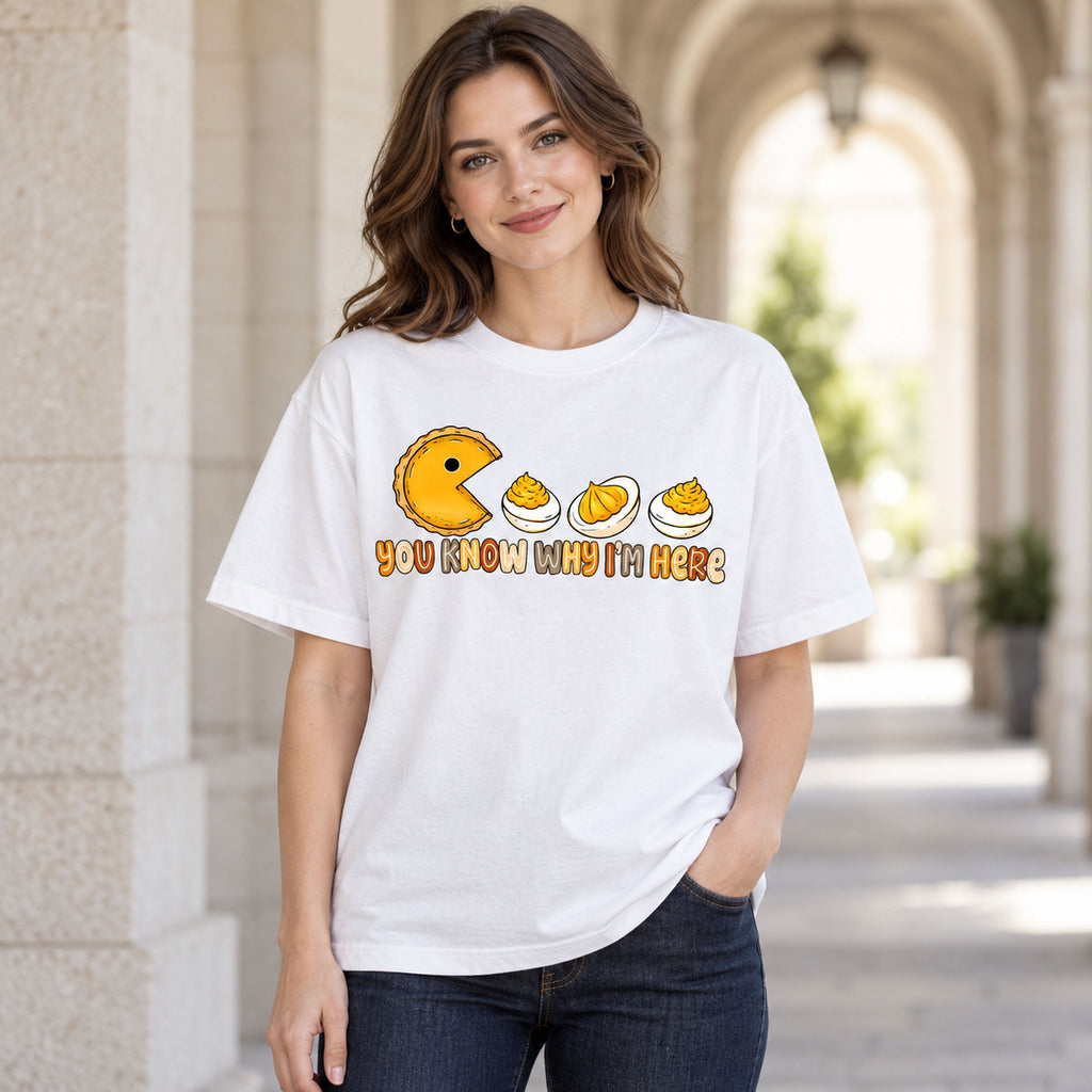 You Know Why Im Here deviled eggs and yellow chomping character graphic on white T-shirt front, adult model photo