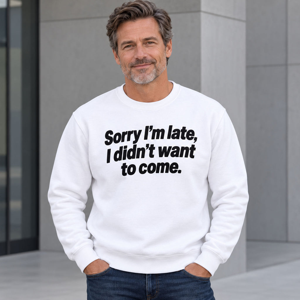 Sorry I’m Late sarcastic front print on a white sweatshirt, male model standing outdoors