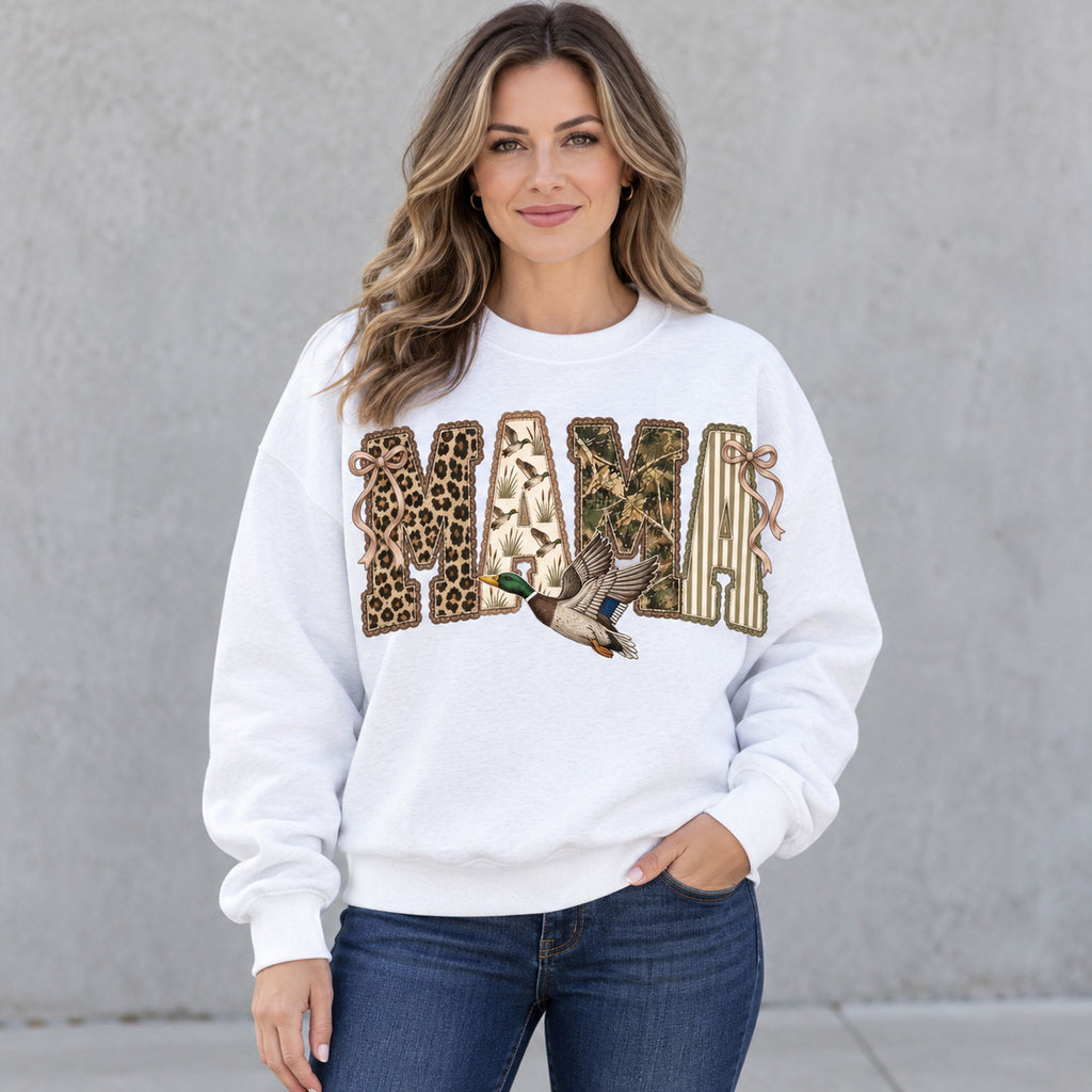 MAMA patchwork-style lettering, bows and flying mallard on white sweatshirt front, adult woman model photo