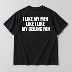 I Like My Men Like I Like My Ceiling Fan black tee back flat lay with white three-line slogan