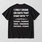I Only Drink on Days That Start With T black graphic tee back flat lay with white lettering and star divider