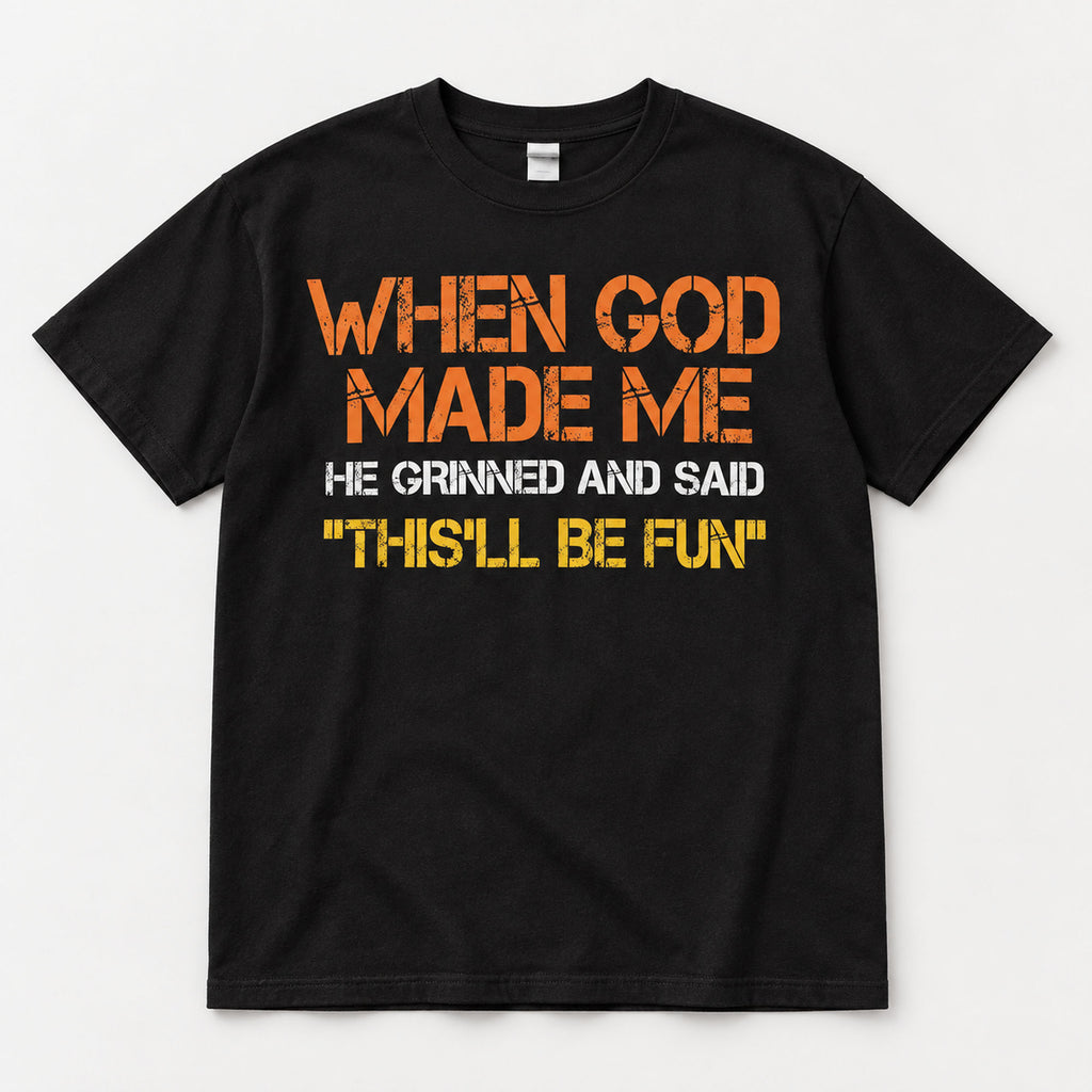 Black When God Made Me T-shirt front flat lay with four lines of lettering and the This'll Be Fun punchline