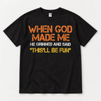 Black When God Made Me T-shirt front flat lay with four lines of lettering and the This'll Be Fun punchline