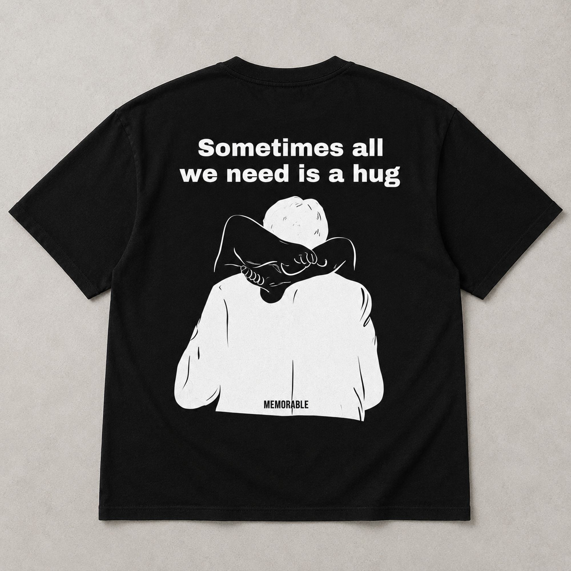 Sometimes All We Need Is A Hug graphic tee black back flat lay