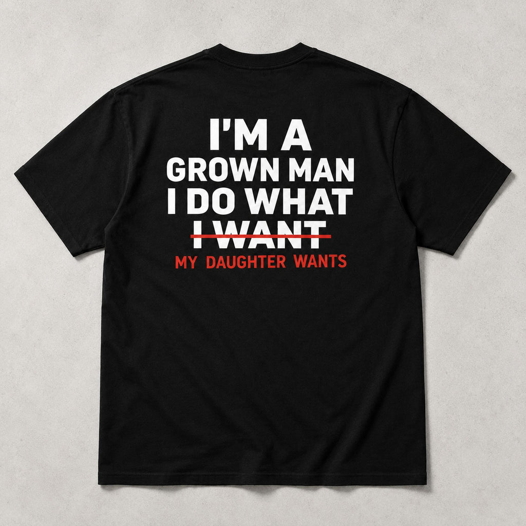 I'm A Grown Man My Daughter Wants black back print graphic tee flat lay