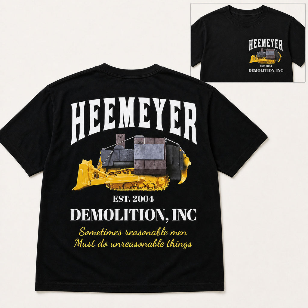 Heemeyer Demolition Inc double-sided graphic tee black back flat lay with front chest inset