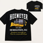 Heemeyer Demolition Inc double-sided graphic tee black back flat lay with front chest inset