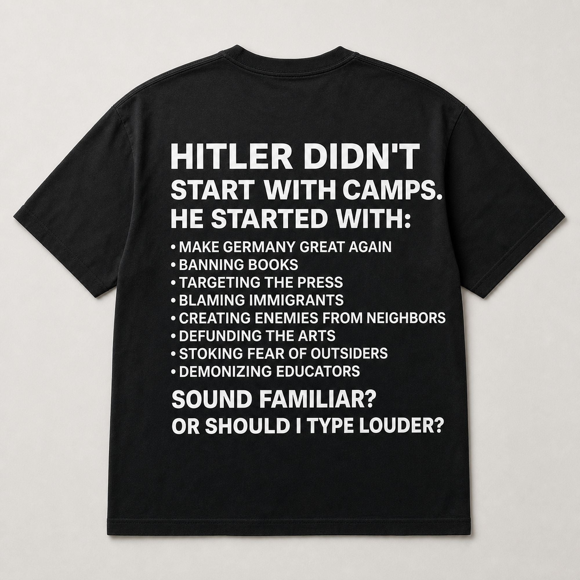 Hitler Didn't Start With Camps historical warning black graphic tee back flat lay