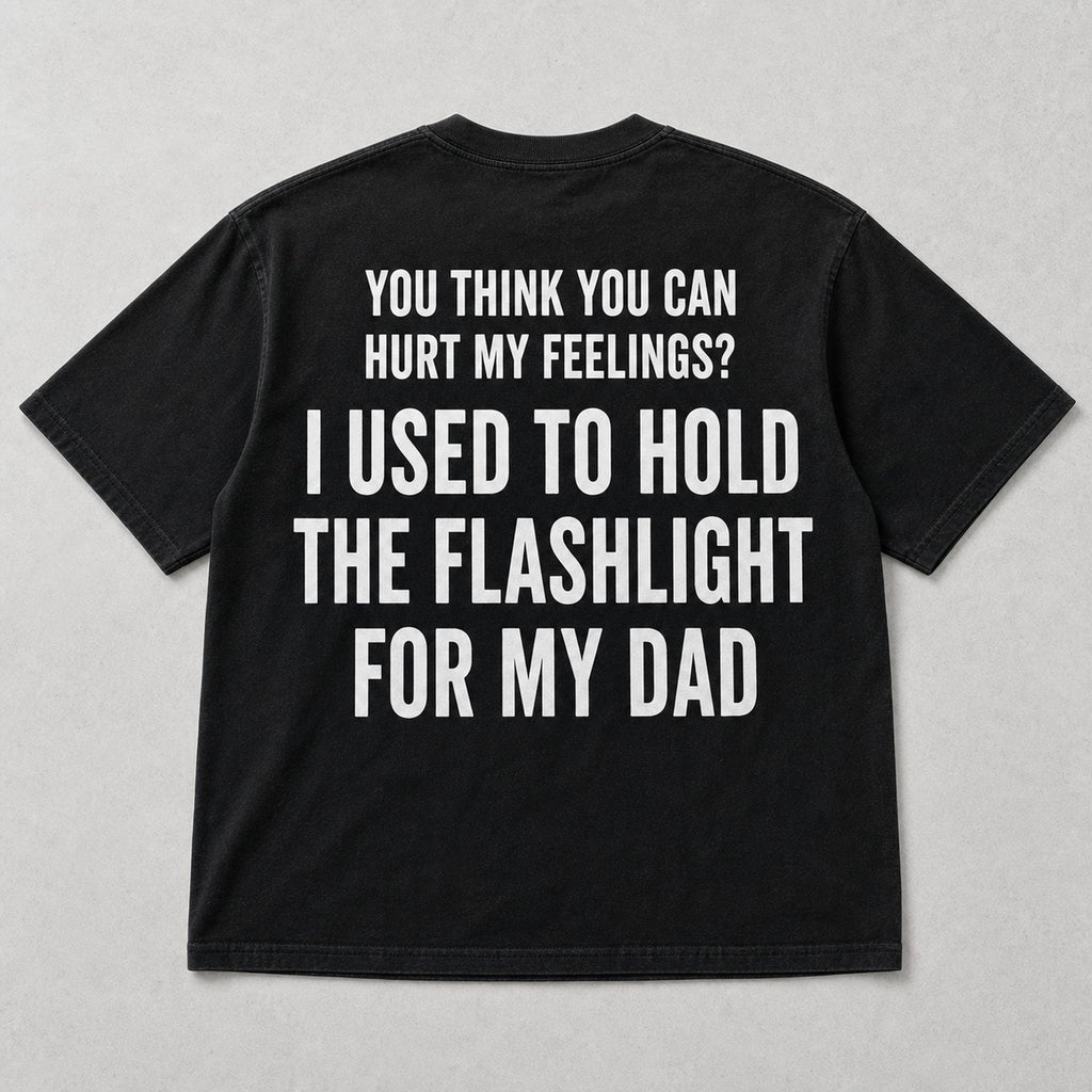 I Used To Hold The Flashlight For My Dad funny graphic tee black back print flat lay