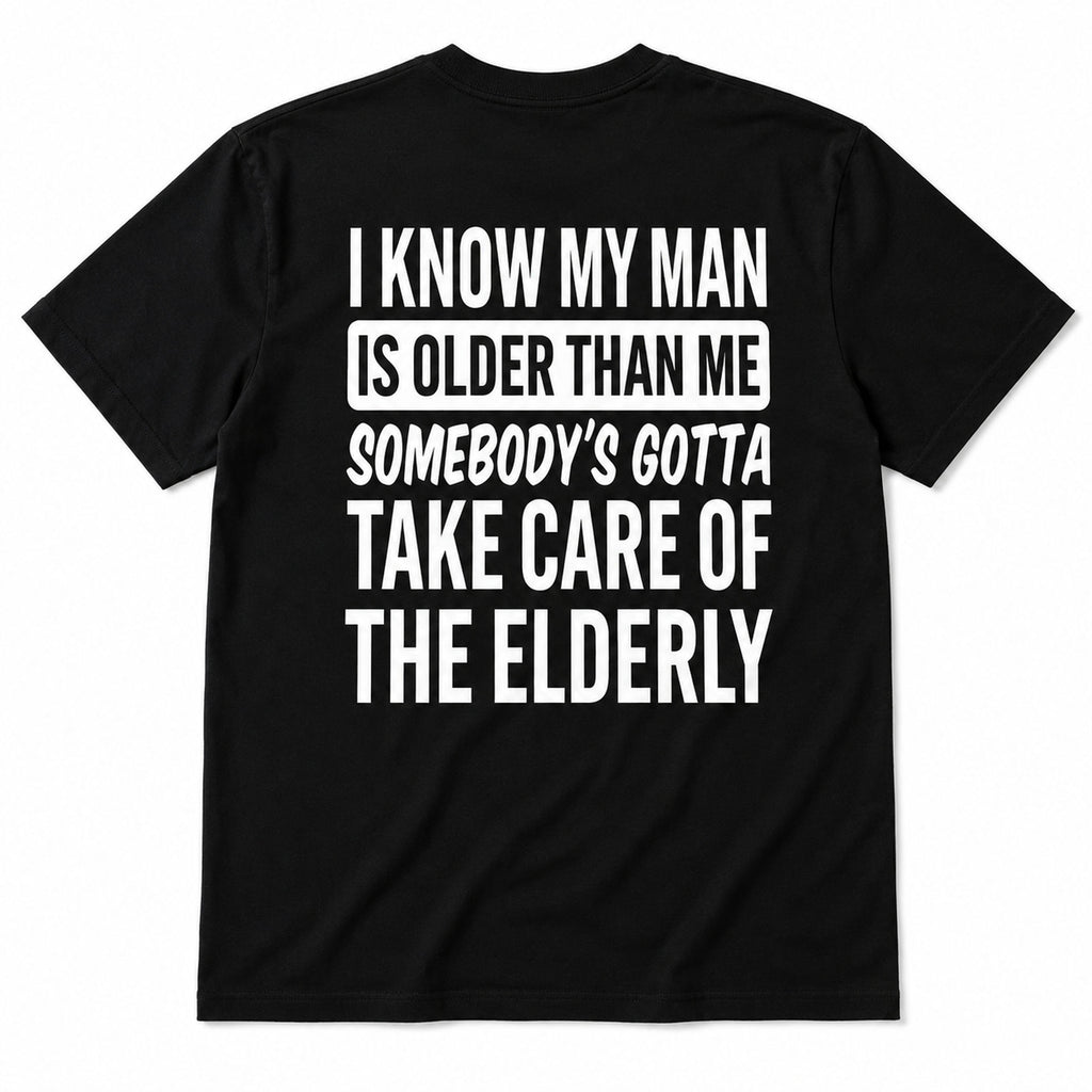 Black I Know My Man Is Older Than Me graphic tee, full back flat-lay with white slogan