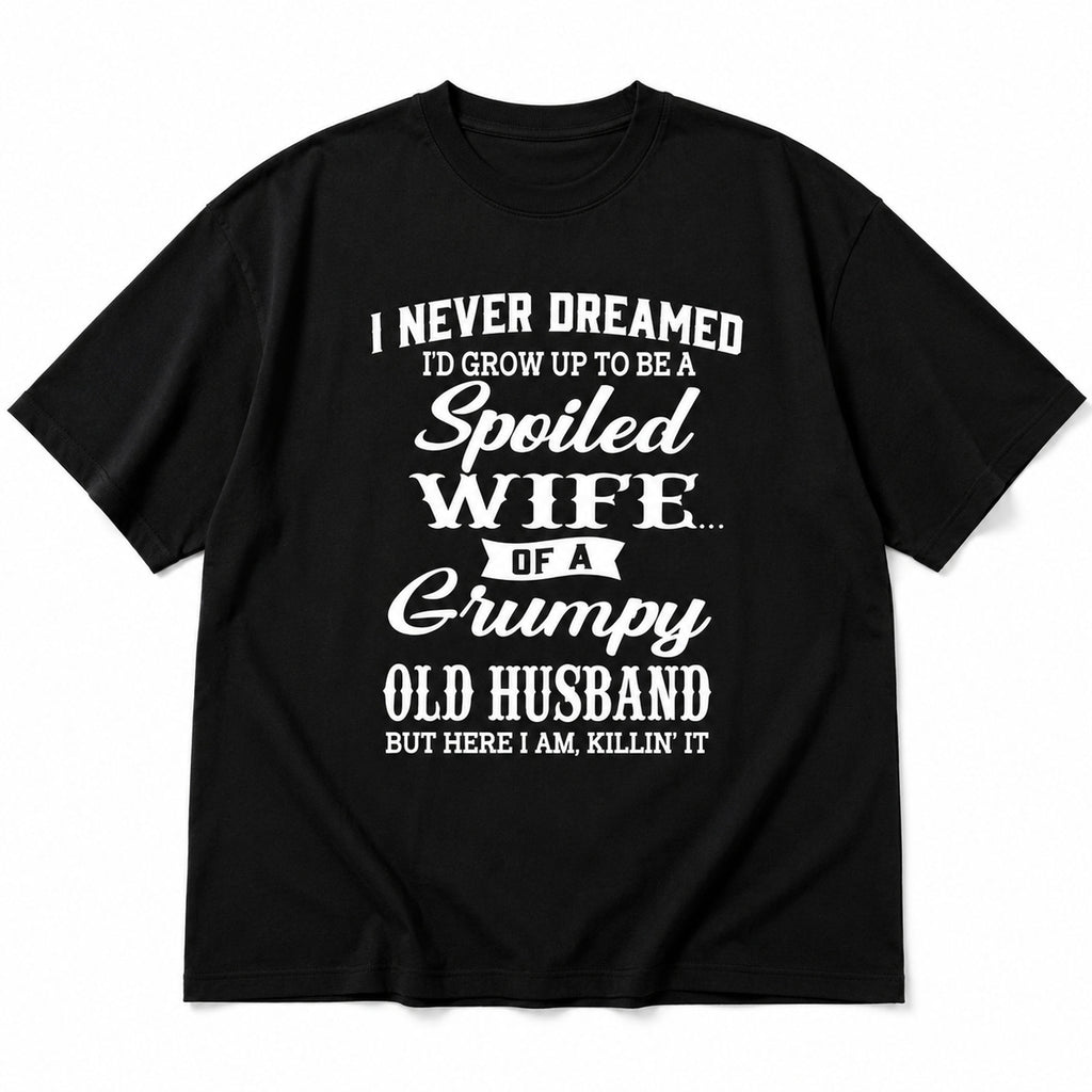 Spoiled Wife of a Grumpy Old Husband black graphic tee front flatlay with white script and bold lettering