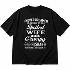 Spoiled Wife of a Grumpy Old Husband black graphic tee front flatlay with white script and bold lettering