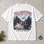 Yellowstone bison national park graphic tee white front flat lay with compass