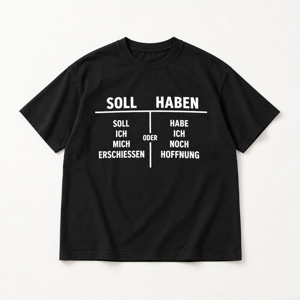 Soll Haben German accounting wordplay and original dark-humor table graphic on black T-shirt front, flat lay showing complete print
