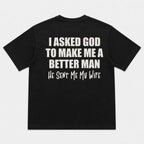 I Asked God Better Man wife faith graphic tee black back flat lay