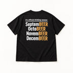SeptemBEER OctoBEER NovemBEER DecemBEER black T-shirt back flat lay, wider view