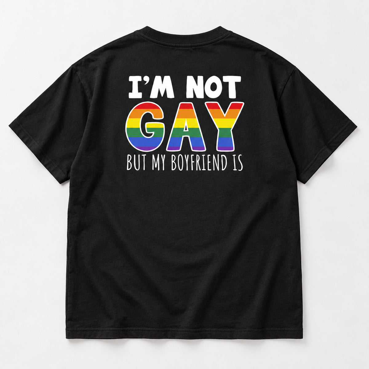 I'm Not Gay But My Boyfriend Is black tee flat lay, rear view with white text and rainbow back graphic