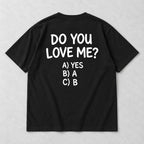 Black graphic tee back flat lay with Do You Love Me design