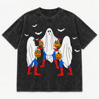 Black graphic T-shirt flat lay showing three ghosts, pumpkins and bats